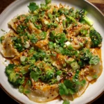 Oven-Baked Dumplings with Peanut Sauce