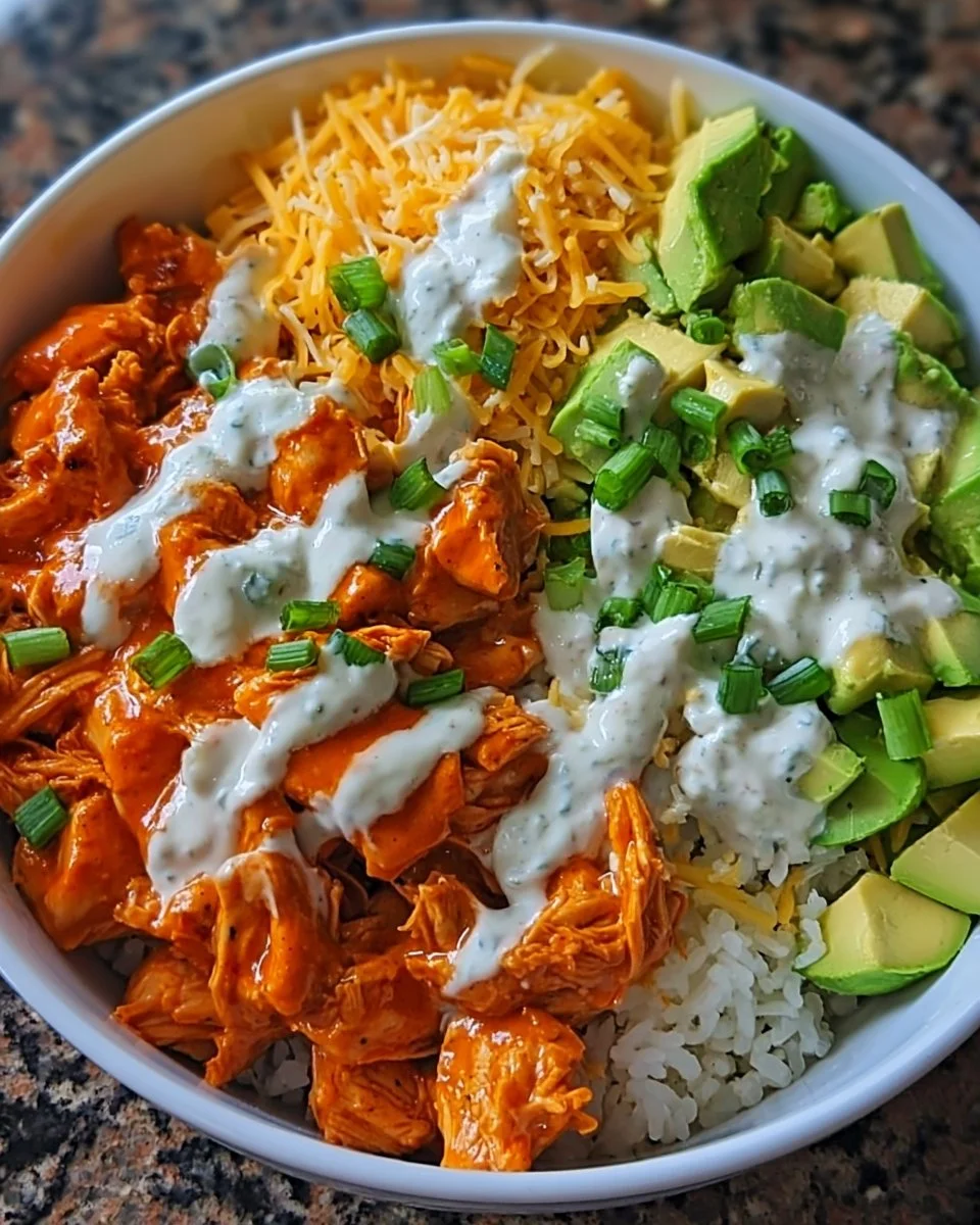 Delicious buffalo chicken bowl topped with fresh ingredients