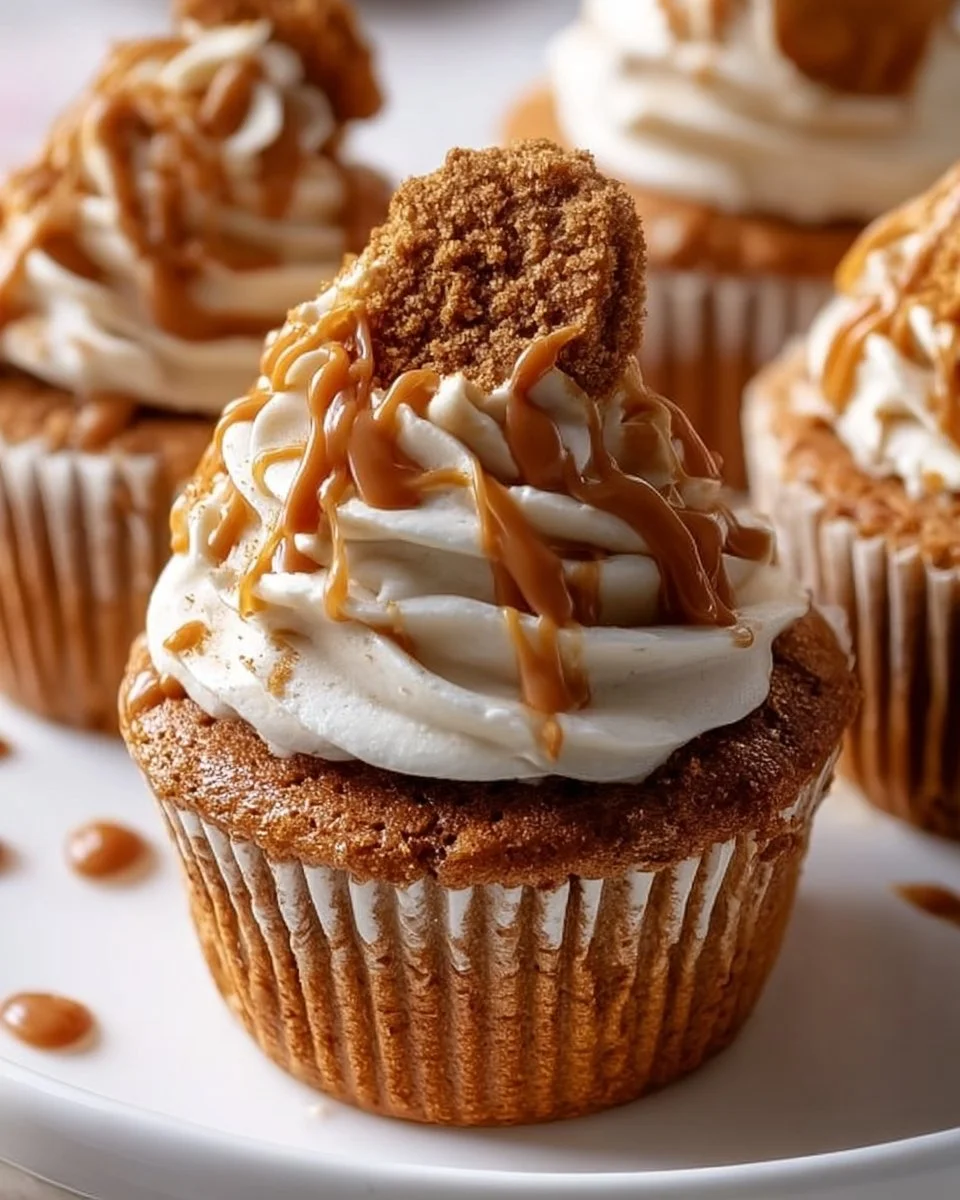 Delicious Biscoff Cookie Butter Cupcakes with frosting and cookie crumbs