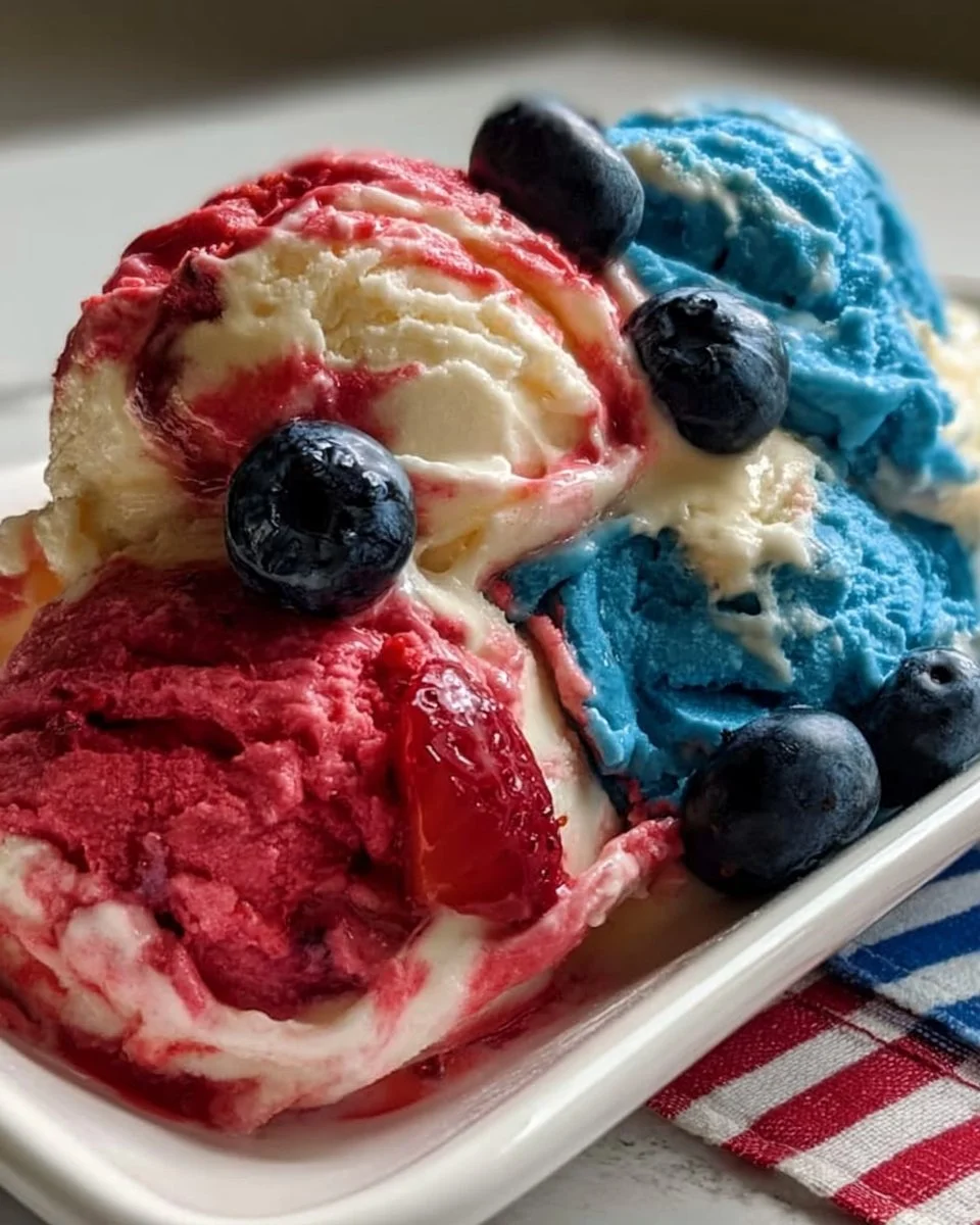 A bowl of Red, White, and Blue Ice Cream featuring patriotic colors.